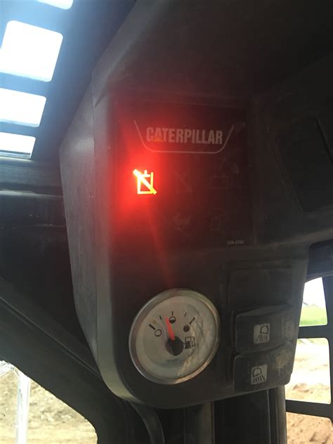 caterpillar skid steer troubleshooting lights